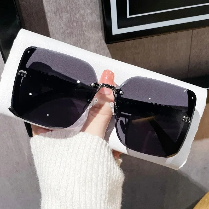 Luxury Women's Rimless Vintage Sunglasses with UV400 Protection