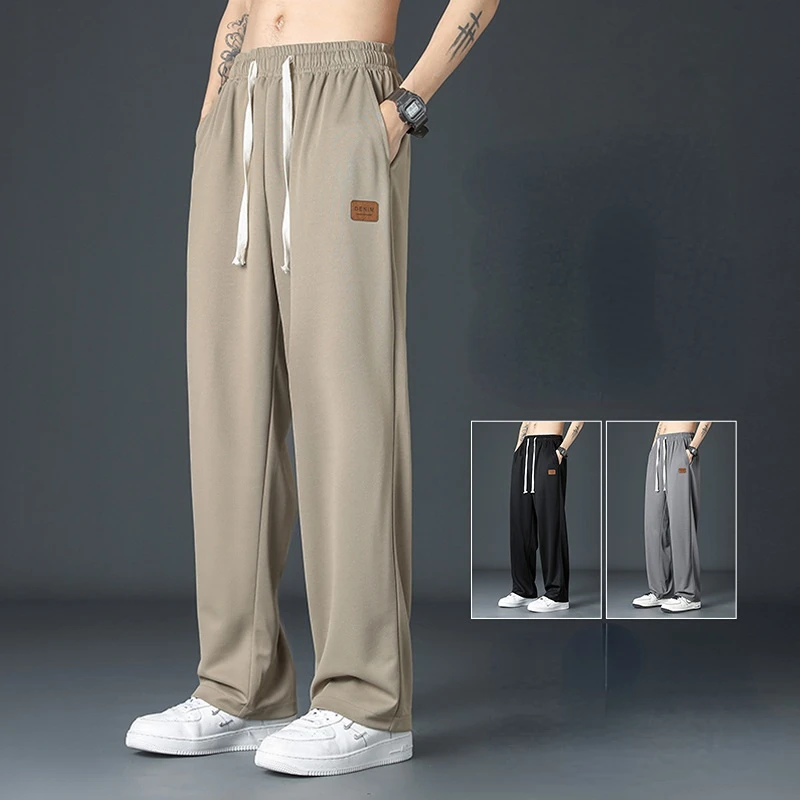 Spring Summer Men Oversize Casual Pants Fashion Male Drawstring Elastic Waist Solid Loose Sports Wide Leg Straight Trousers wide leg pants