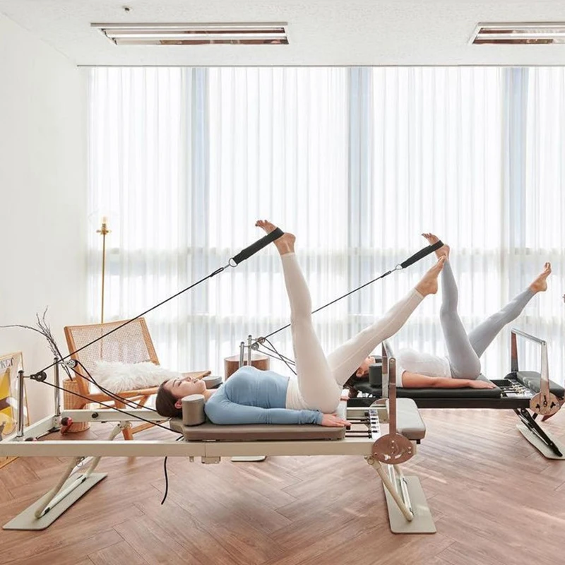Máquina de entrenamiento de fuerza, equipo de Fitness para Pilates, cama de  Yoga plegable para el hogar - AliExpress