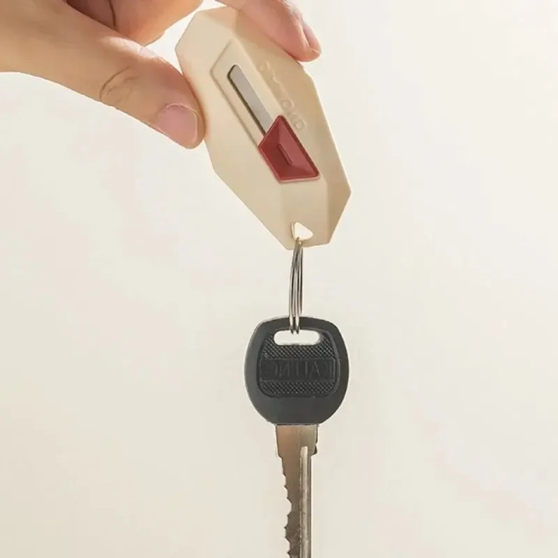 1pc 다기능 미니 포장 풀기 도구 자동 리바운드 휴대용 톱니형 포장 풀기 장치 미니 커터 편지 오프너