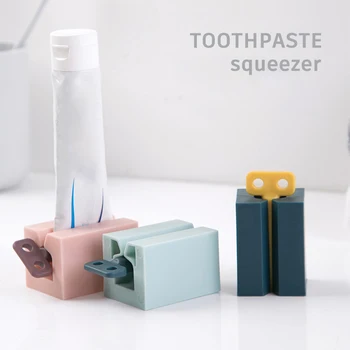 Spremiagrumi per tubi di dentifricio in plastica per uso domestico, dispenser facile, portarotolo, forniture per il bagno, accessori per la pulizia dei denti 1