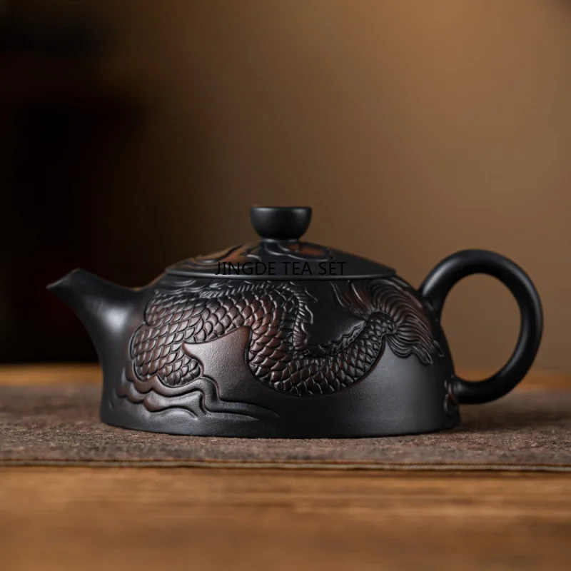 Purple pottery zodiac dragon carving handmade antique relief teapot household teapot Kung Fu tea set teapot