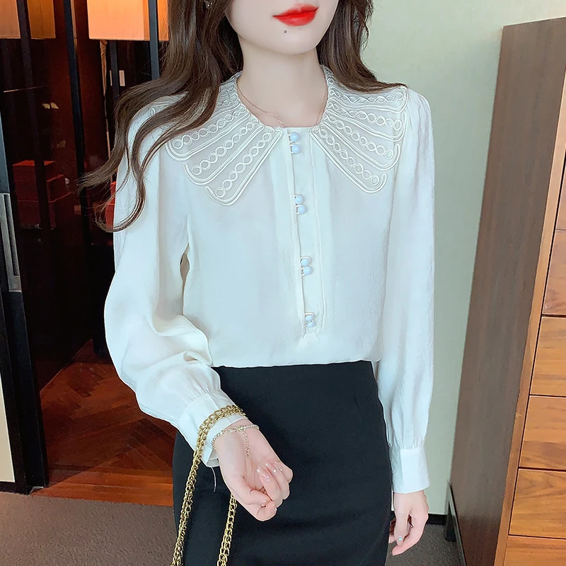 

Simple Yet Chic Solid Color Ladies' Button-Up Shirt for Any Occasion Elegant and Versatile Women's blouses with French Style