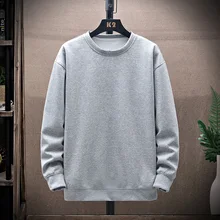 

Spring 2022 Crew Neck Top Layered Over Solid Color Loose Sweater