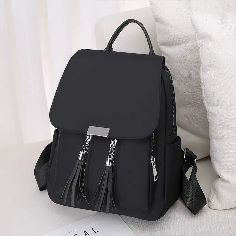 Say goodbye to being bulky! A dual-purpose Oxford cloth backpack for girls, featuring lightweight design and strong load-bearing