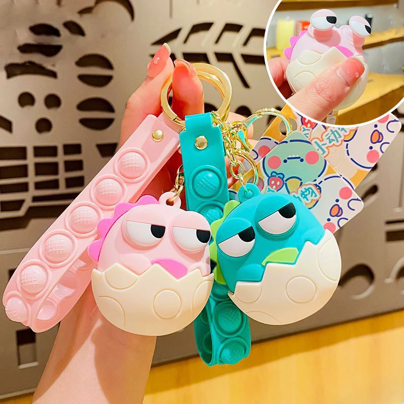 Cartoon Big Eyes Animal Green Dinosaur Decompression Portachiavi Per Le Donne Cute Pink Dinosaur Egg Doll Car Portachiavi Bag Ciondolo Regalo
