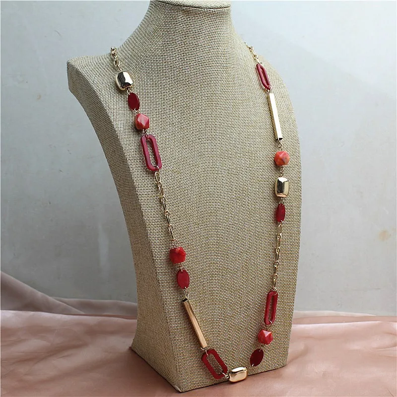 Collana lunga con laccio nero, pendente circolare in resina arancio - Mya Accessories