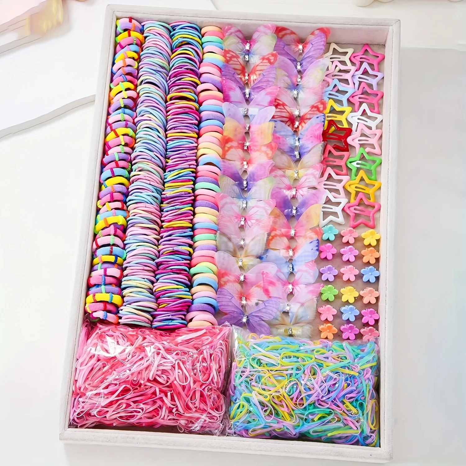 941 collection of colorful and cute clothes for girls | Includes various clips, hair ties, flowers, and double-layered bow-shaped headbands.