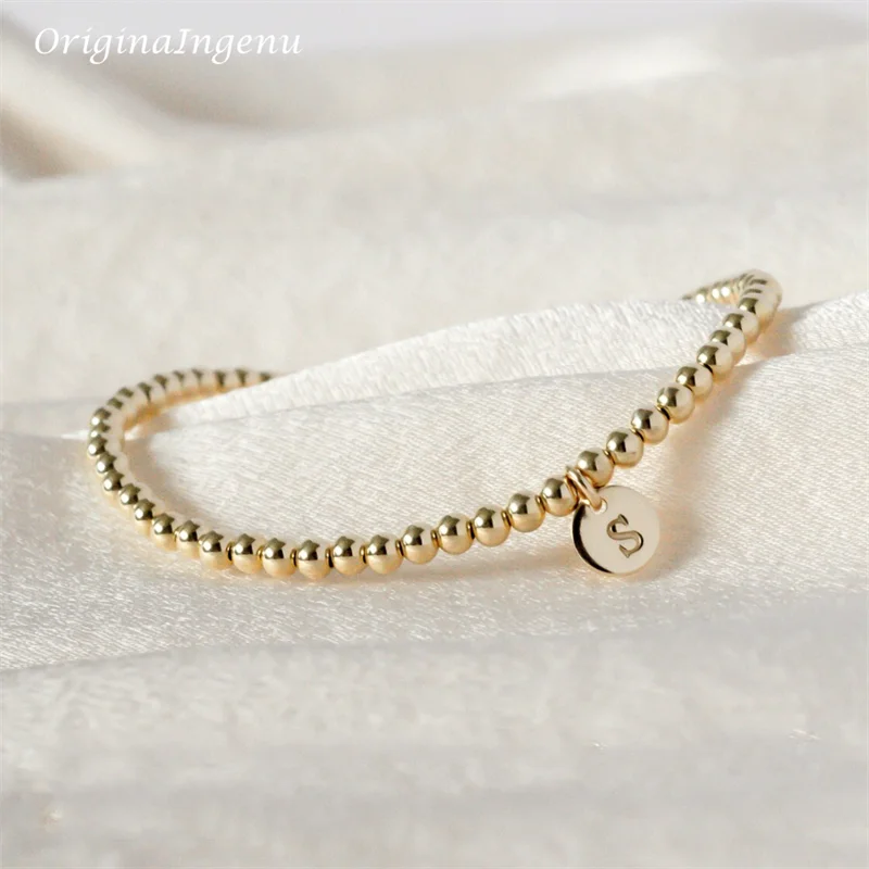 Set di braccialetti con perline riempiti d'oro: braccialetti elastici con coriandoli petardi - Italia