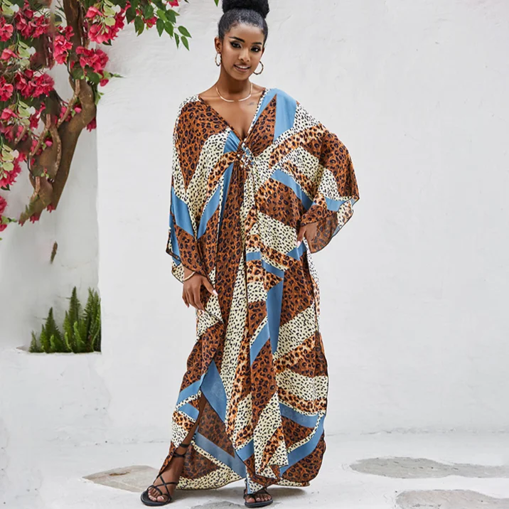 

Женское платье оверсайз с леопардовым принтом, длинным рукавом и воланом