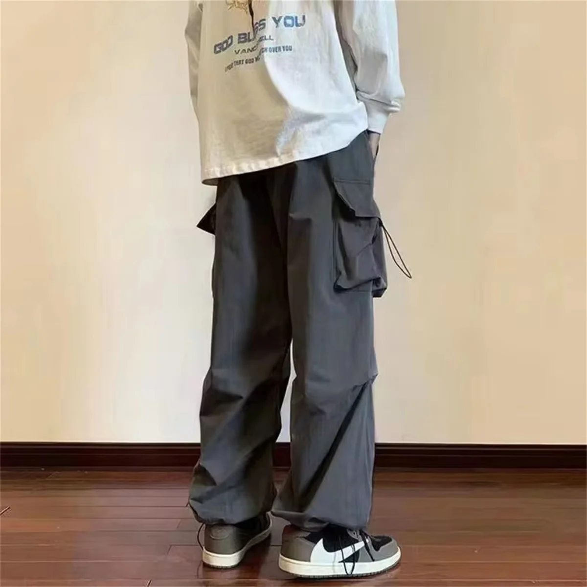 Streetwear 2024 Spring Harem Casual Pants Men Elastic Waist Solid Color Cargo Pants Multi Pocket Loose Baggy Pants For Women 4