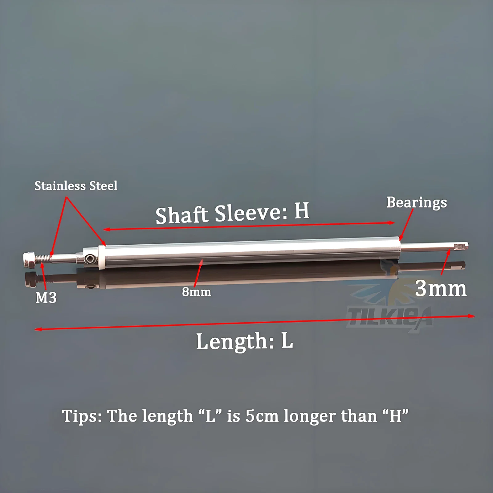 Arbre de transmission pour bateau RC de 10cm en acier inox 304, à côté d'une règle pour échelle.