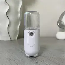  New Spot nano spray water replenishing apparatus face moisturizing humidifier portable charging beauty apparatus cold spraying 