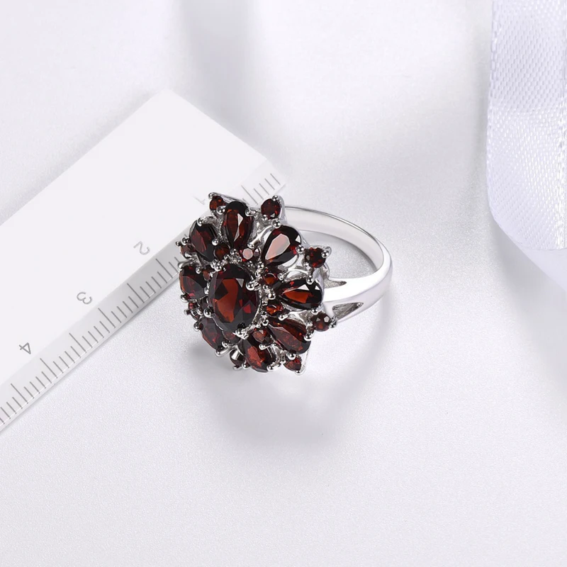 Gu Li Creative Fashion Silver Color Inlaid Garnet Red Zircon Flower Shape Ring For Women Banquet Ring Jewelry Accessories silver ring finger ring