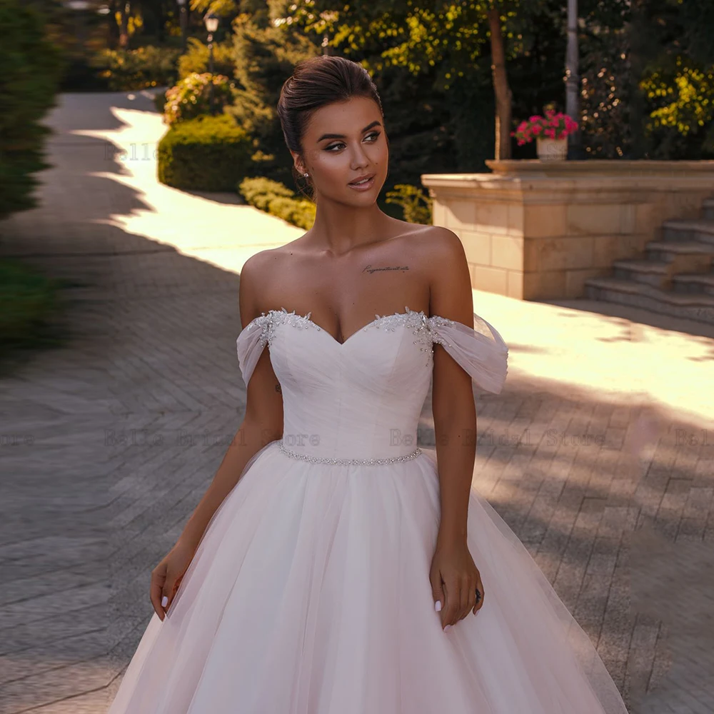 Elegant A-Line Wedding Dresses 2023 Off Shoulder Detachable Sleeves African Bridal Gowns Beaded Sweep Train Tulle Custom Made
