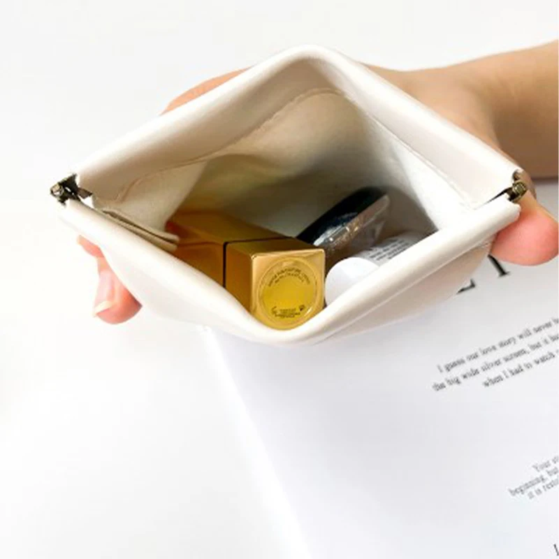 小物 MINI CLASP POUCH Accessory-pouch-Small-9.jpeg