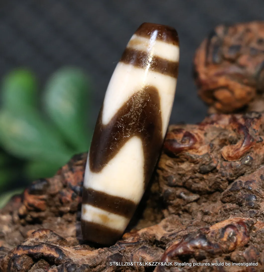 

Коллекционная энергия, тибетский Старый Агат, масляная патина, острые тигровые зубы, бусины дзи, защита от мозолей