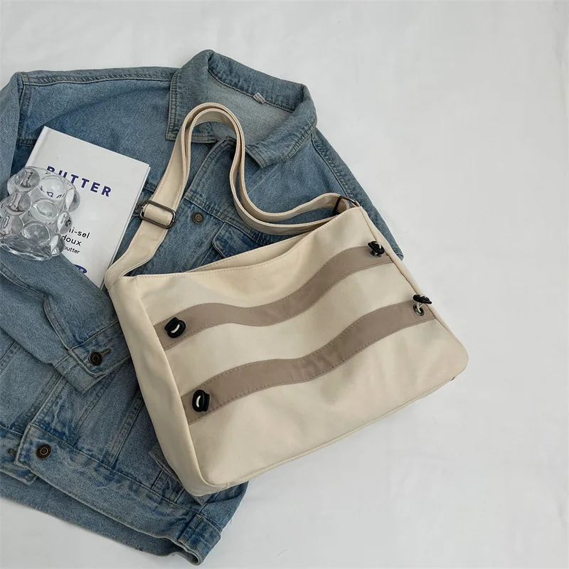 Bolso de lona para mujer, nuevo bolso de invierno de moda, versión coreana, gran capacidad, informal, sencillo, para estudiantes, bandolera de hombro