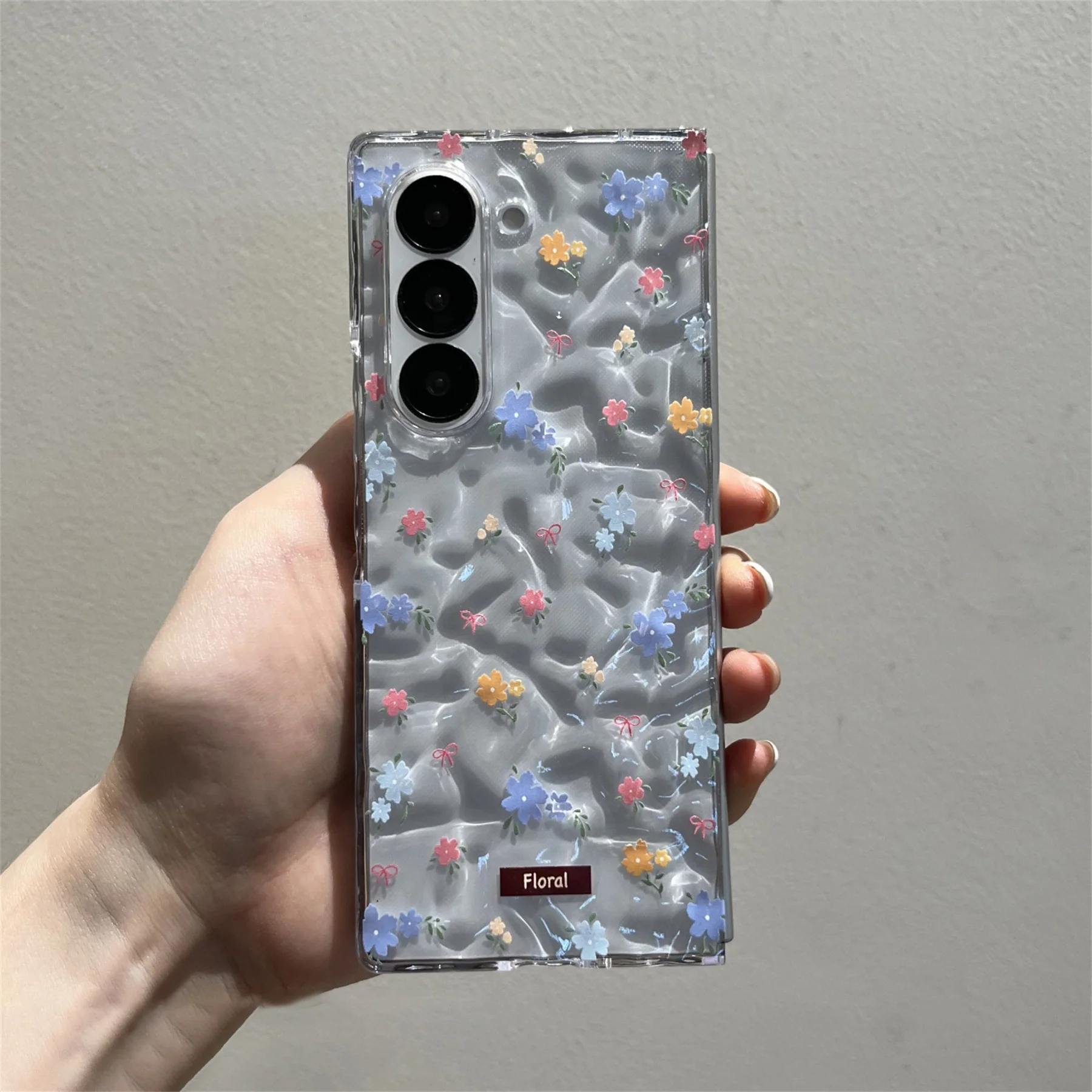 Cute Blue Floral Transparent Phone Case with Flower Chain Accents