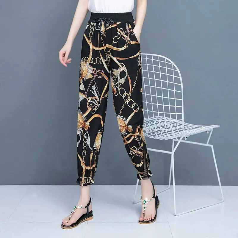 2023 New Summer Trendy Mesh Hollowed Out Print Quick Drying Loose Fitting Casual Leggings Thin Cropped Women's Harlan Pants plus size women s summer new personality contrast color patch denim cropped pants elastic waist was thin harlan carrot pants