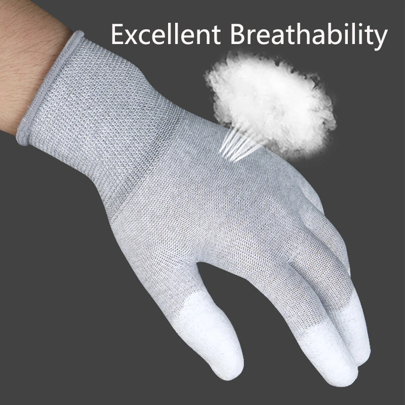 Gants nitrile jetables gris de taille L, idéaux pour une protection légère et ajustée.