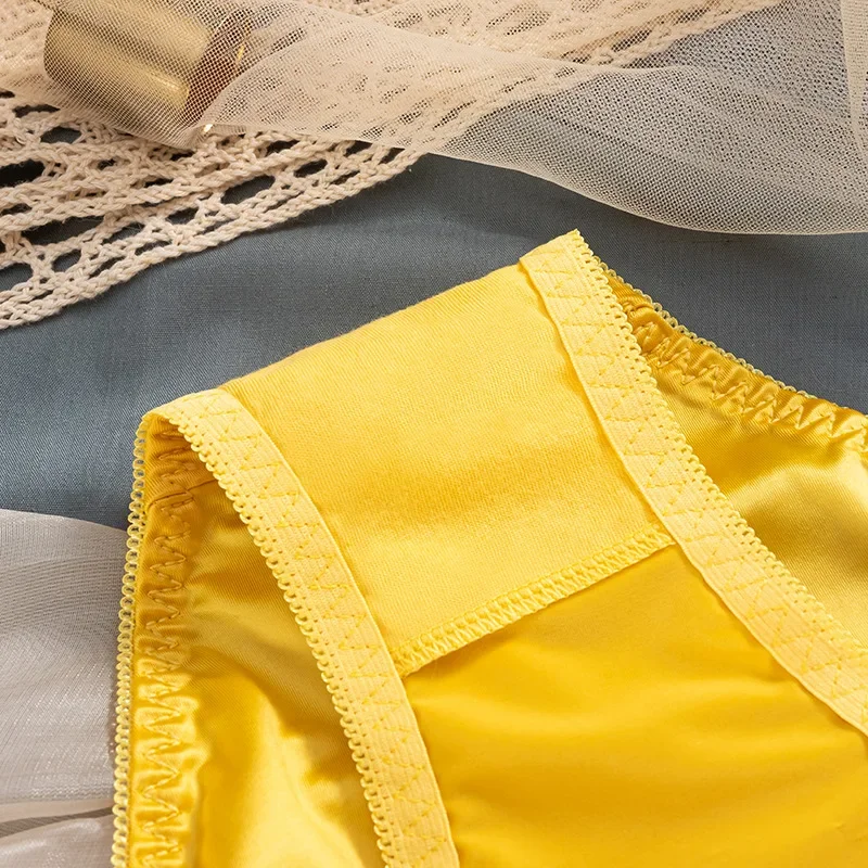 Description Picture 6 of itemNew Silk Satin Surface String Ladies Sexy Underwear Solid Color Metal Heart Hollow Out Slips Thong Panties Breathable