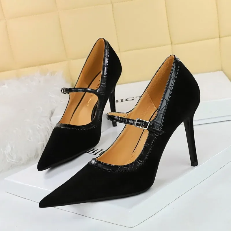 

Vintage black high-heeled stilettos with super-high heel pumps with pointed toes