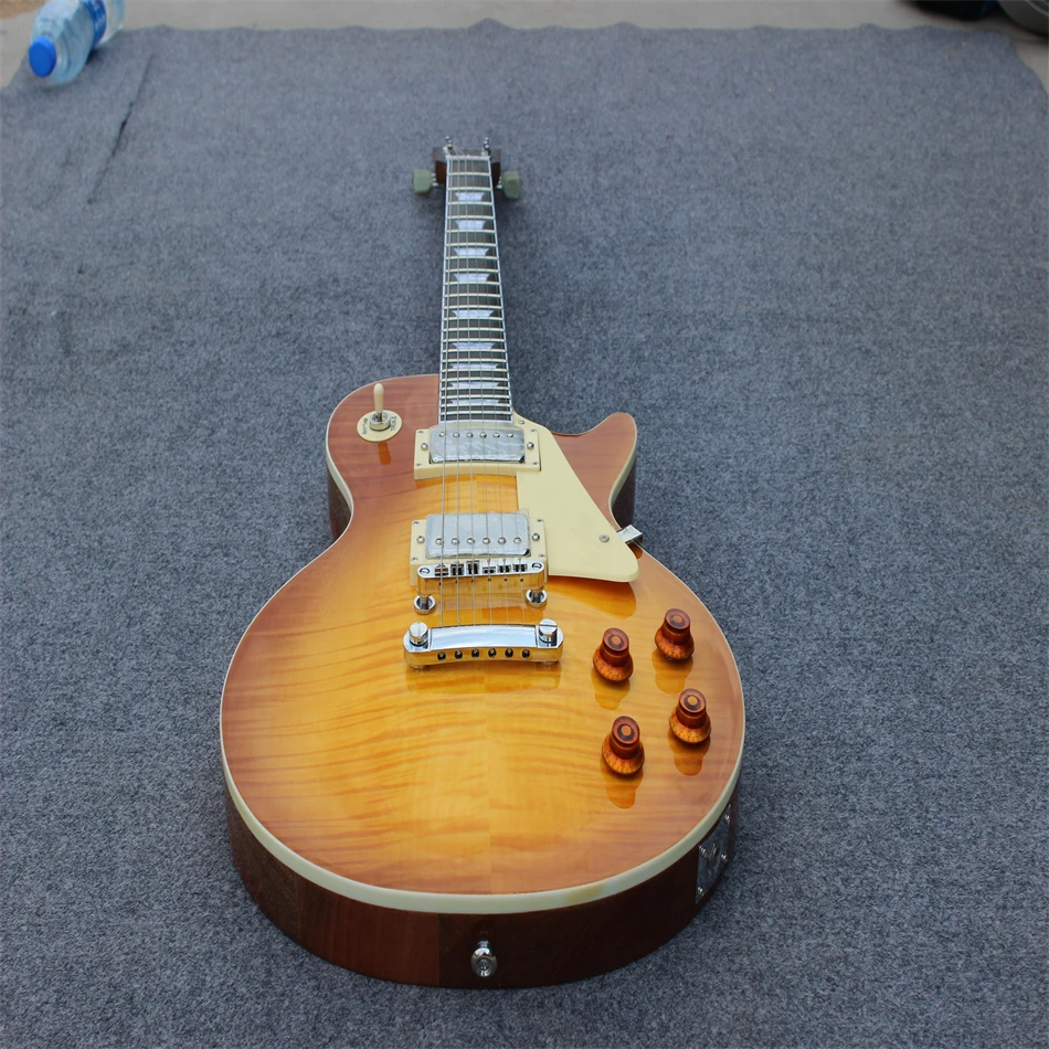 

Free shipping, high quality electric guitar, honey color, flame tiger print, silver hardware, can be customized