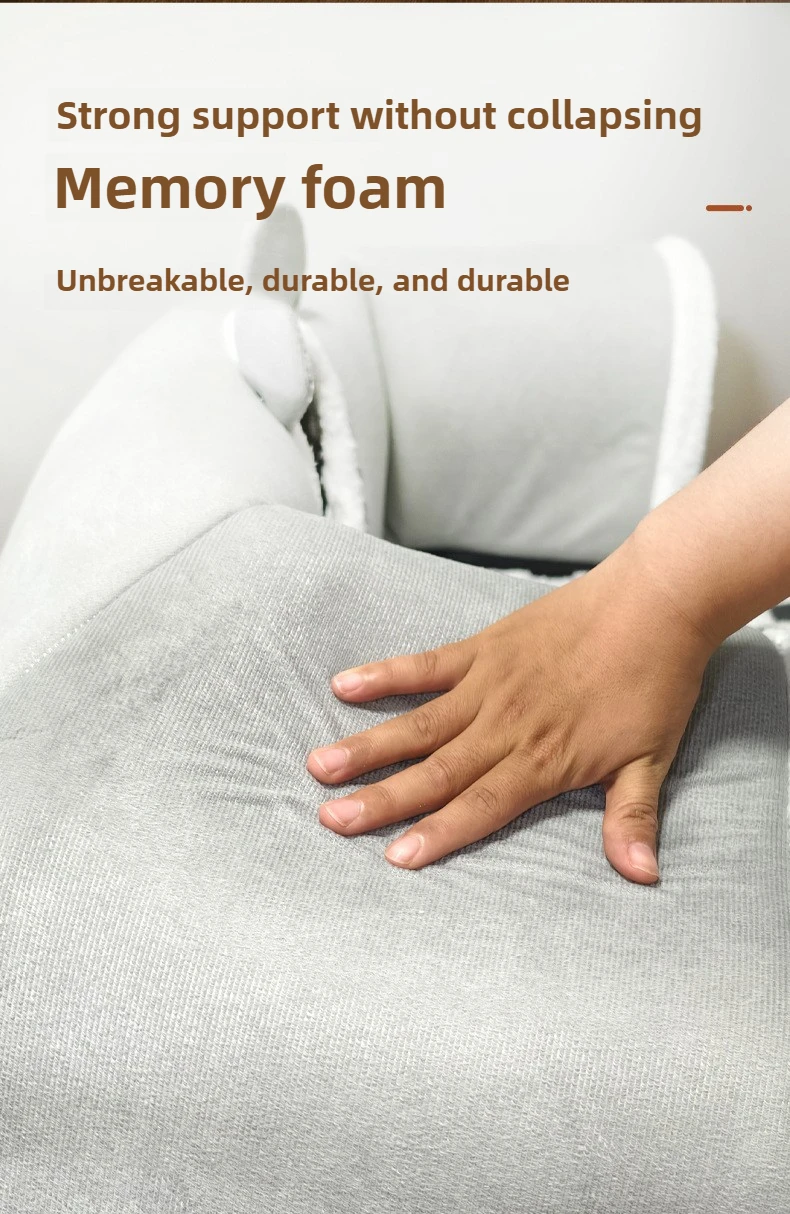 A hand presses a gray memory foam cushion in the KittyNook Cat Co. Interactive U-shaped Cat Tunnel, showing its support.