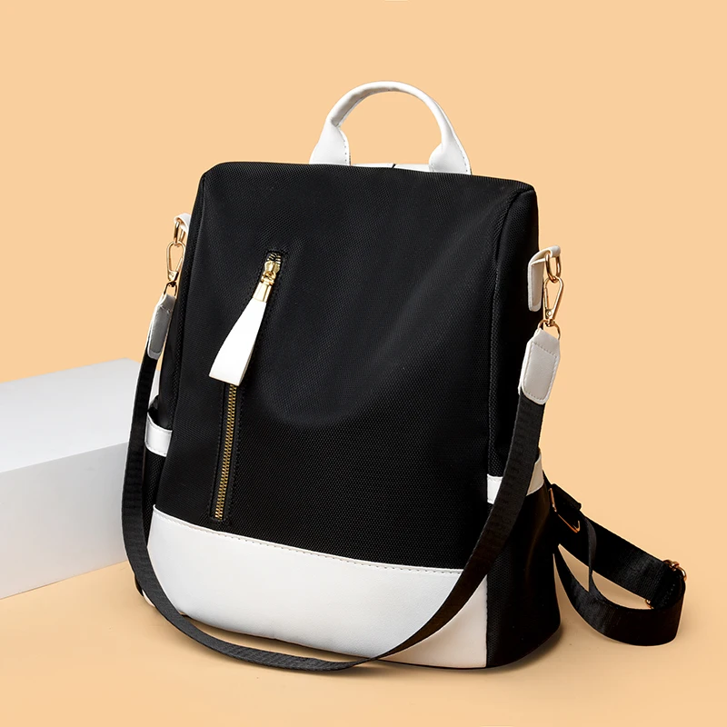 Women's travel backpack, large capacity, zipper closure, convertible shoulder bag design, perfect for school, work or travel