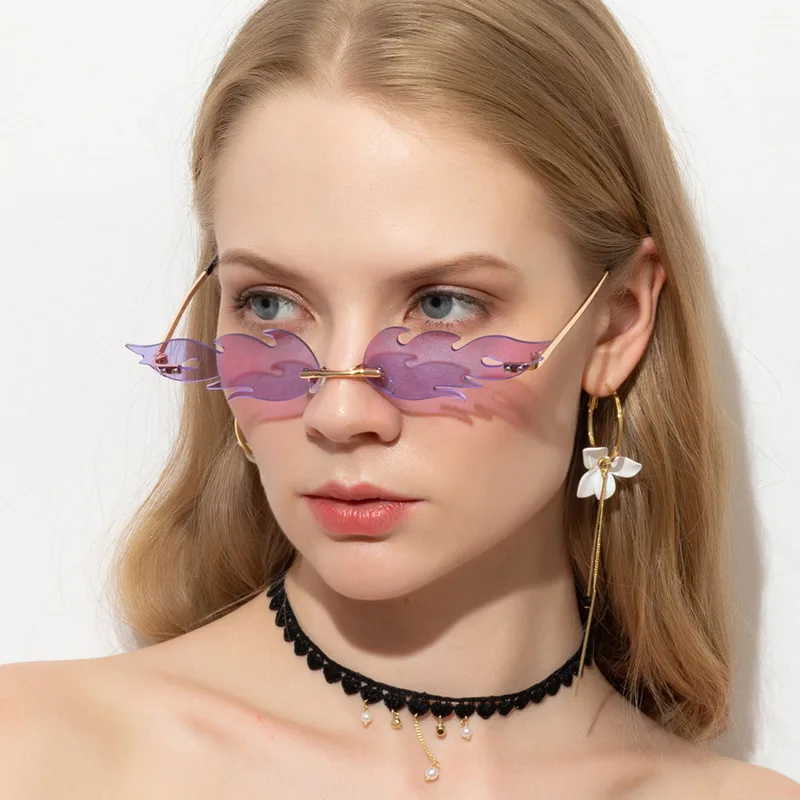 

2022 Luxury Fashion Fire Flame Sunglasses Women Rimless Wave Sun Glasses Metal Shades For Vintage Women Mirror Eyewear UV400