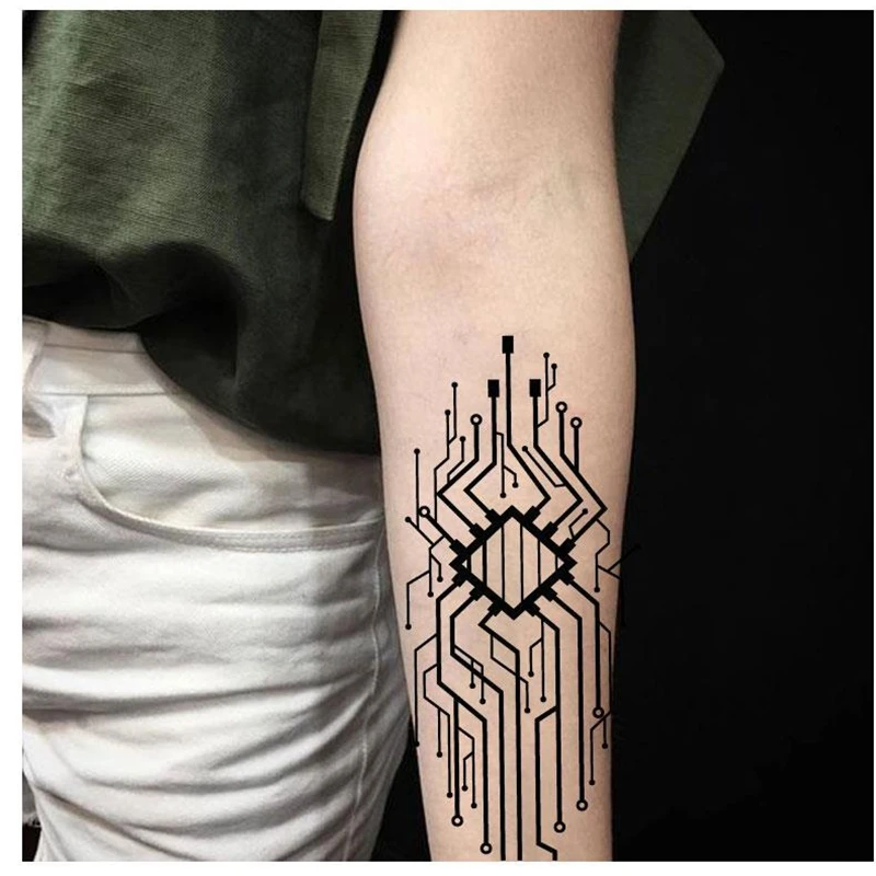 Artist takes inspiration from circuit boards to create futuristic tribal  tattoos  Daniel Swanick