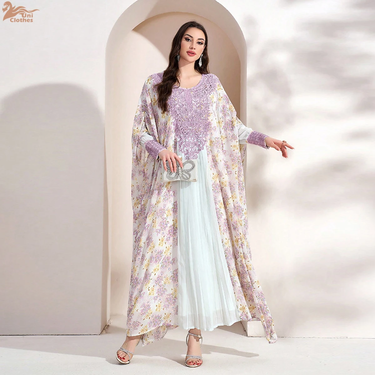 Uni Dubai فساتين أنيقة بأكمام تشبه جناح الخفّاش وم...