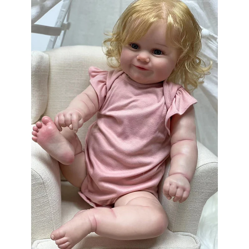 Muñeca Reborn Pinky De 60 Cm - Pelo Rubio Enraizado, Cuerpo Suave Articulable - Cumple Normas De Seguridad Para +3 Años