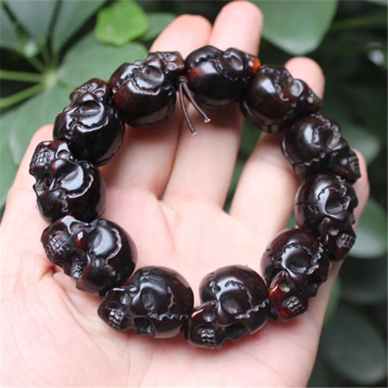 

Natural yak horn bracelet for men and women skull head corpse Tuolin master evil spirit text bone bracelet