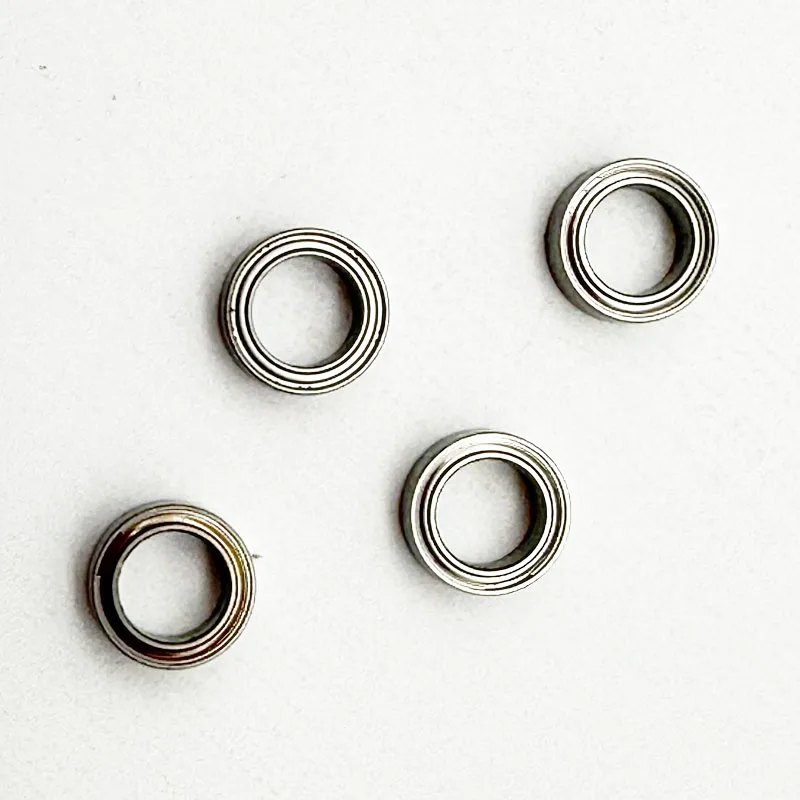 Roulements à billes de précision pour voiture RC SCY et MJX, vue détaillée des pièces métalliques.