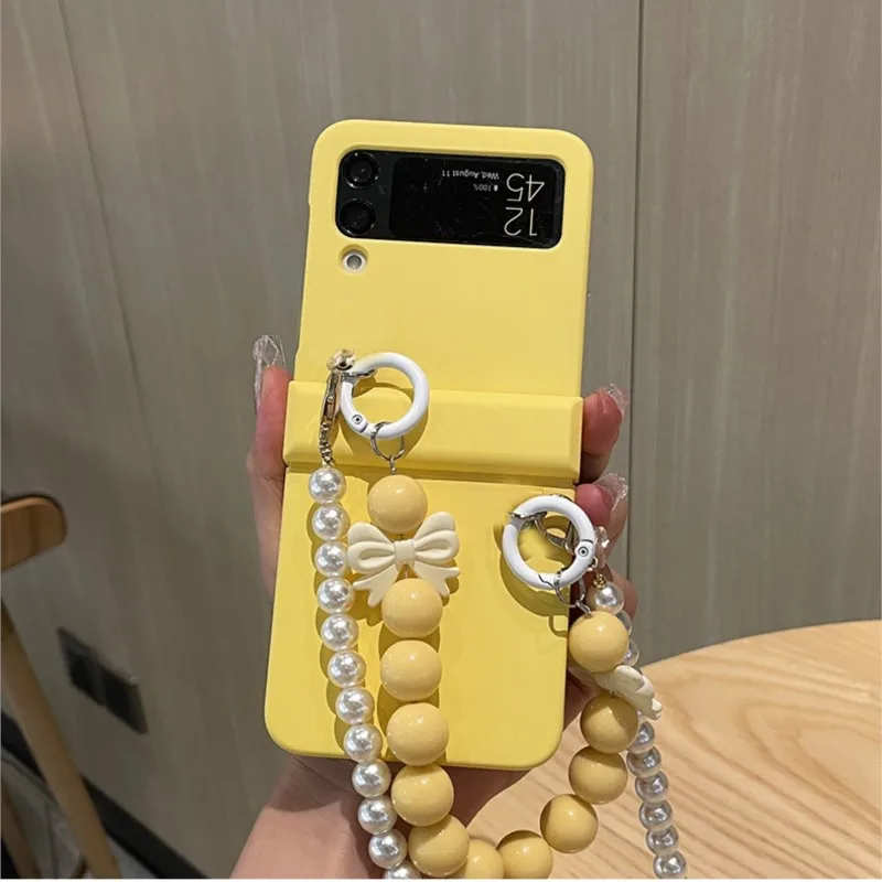 Ins Korea Pearl Lanyard Bow Bracciale Custodia Per Telefono Gialla Per Samsung Galaxy Z Flip 6 Z Flip 5 Z Flip 4 Hand Chain Z Flip 3 Cover