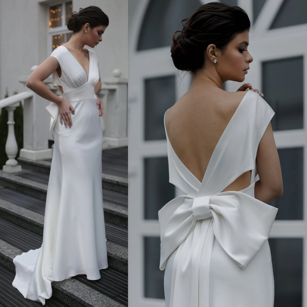 

Sheath Bow V Neck Ruched Wedding Dress Custom Made Empire Waist Oversized Bow Open Back Cutout Elegant Simple Ivory Bridal Gown