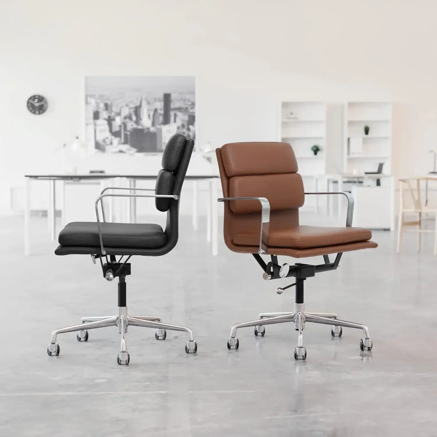 "mid-back ergonomic office chair with padded seat, armrests, swivel, and faux leather upholstery"