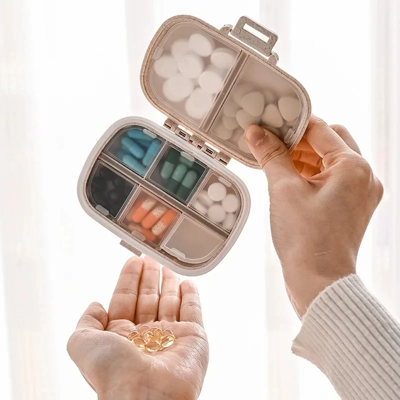 AiQUE Compact Waterproof Pill Organizer – 8-Grid Portable Medicine Storage Box