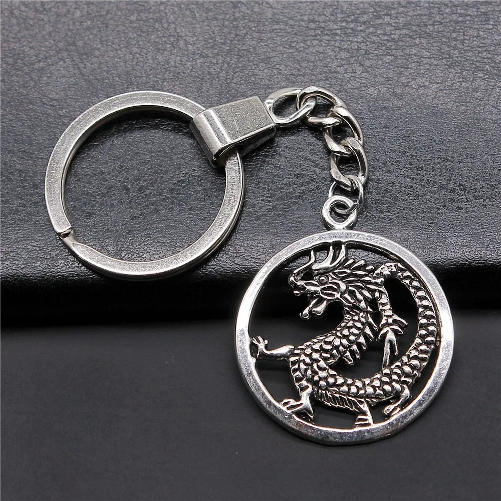FashionJewelryKeychainAntiqueSilverColor37x32mmDragonPendantKeyringSouvenirsGift.jpg