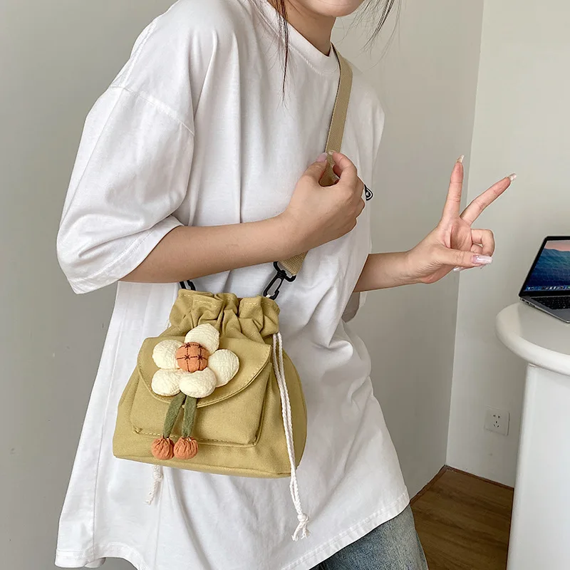 

Women's Drawstring Crossbody Bag for Girls Cute Canvas Bucket Shoulder Bag Fashion Handbag Messenger Bag for Travel Vacation