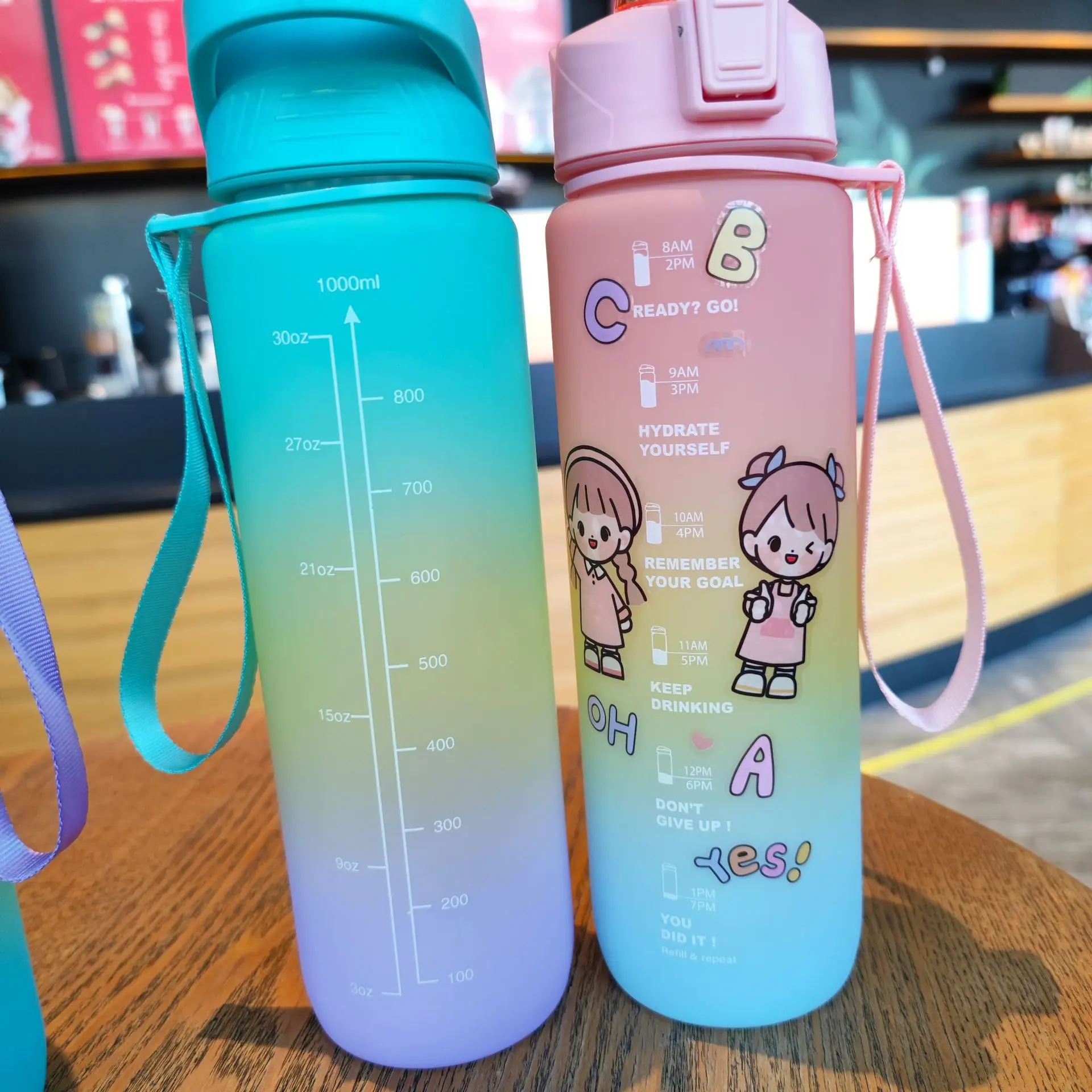 https://ae01.alicdn.com/kf/S85dfd203a7174a8694b51863d2640830X/1000ml-Portable-Large-Capacity-Water-Bottle-Time-Marker-Leak-Proof-BPA-Frosted-Cup-for-Outdoor-Sports.jpg