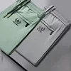 High Elastici Silk Men's Casual Pants Thin Ice Silk Qui Dry Nine Points Summer Faionable Ci Sle Straight Leg Trousers