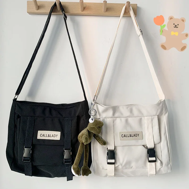 

Women's Fashion Neutral Vintage Sense Simple Crossbody Bag Korean Students Nylon Waterproof Water Mailman Canvas Bags for Women
