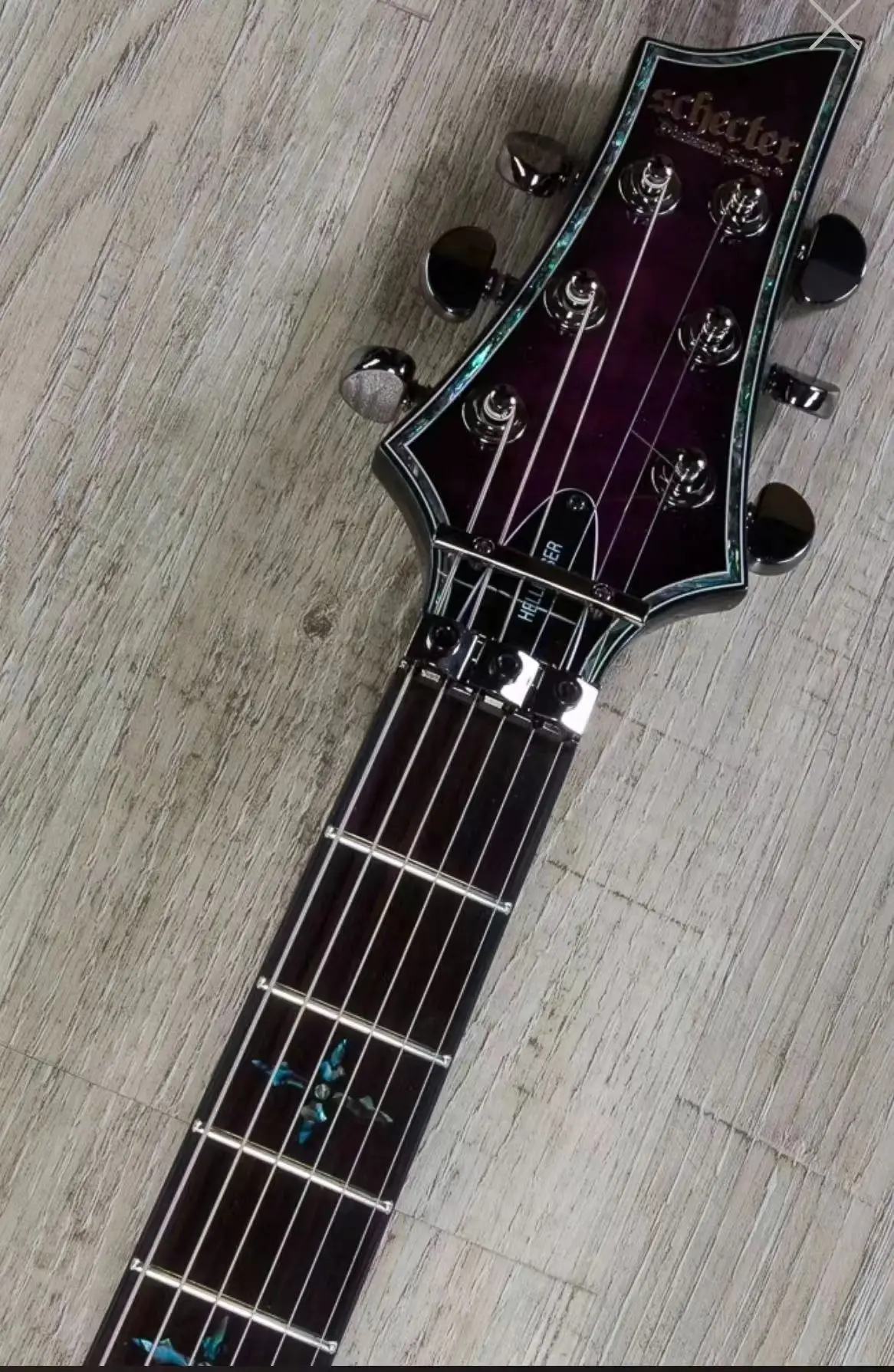6-string electric guitar, rosewood fingerboard, tremolo bridge, EMG active pickup
