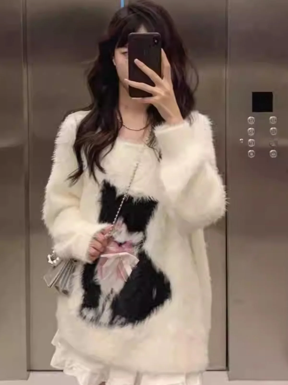 سترة نسائية فضفاضة محبوكة بياقة على شكل V مع نقشة...