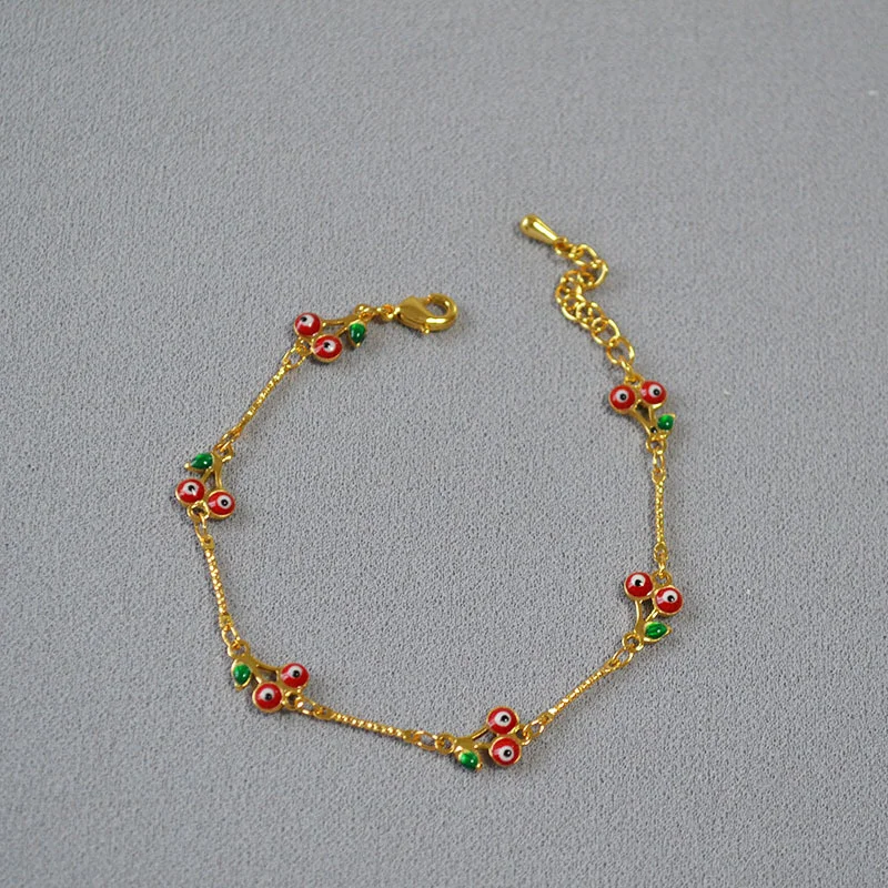 

Japanese and Korean fashion, sweet cute, niche enamel drop glaze, cherry sprite, brass plated bracelet, Qingdao jewelry