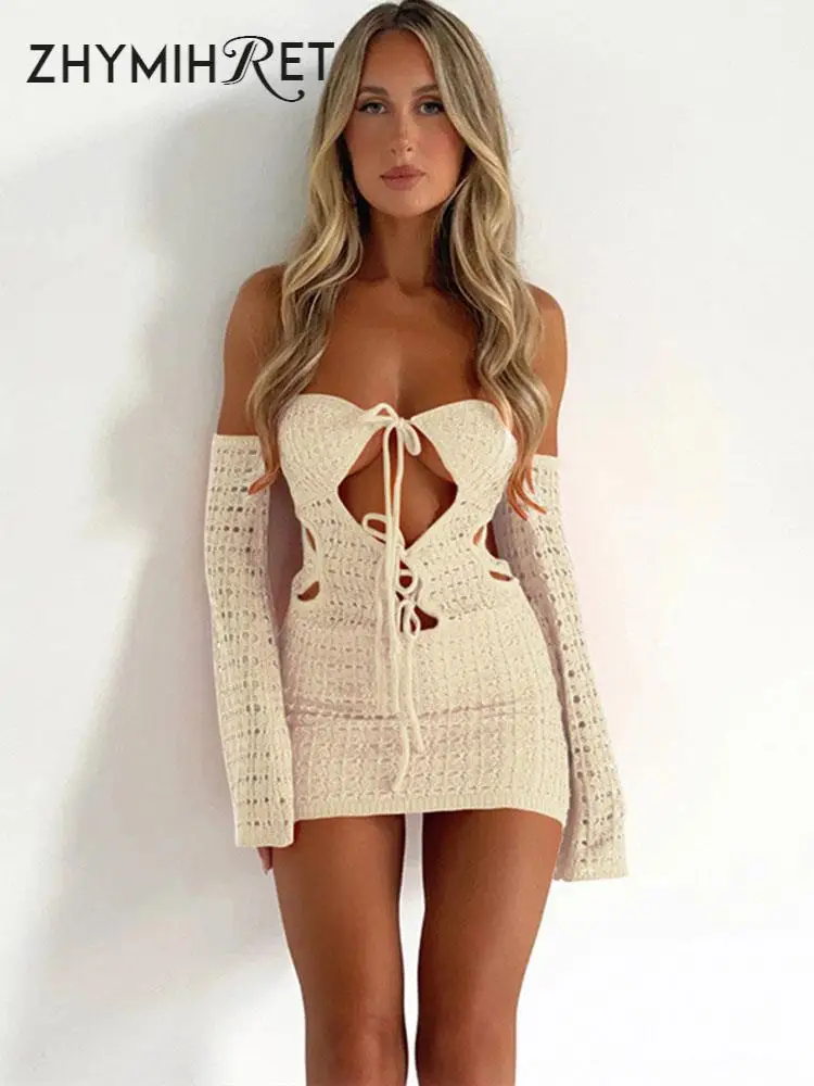 

ZHYMIHRET Crochet Hollow Out Off Shoulder Slash Neck Dress Lace Up Long Sleeve Knitted Mini Dress Holiday Beach Summer Dress