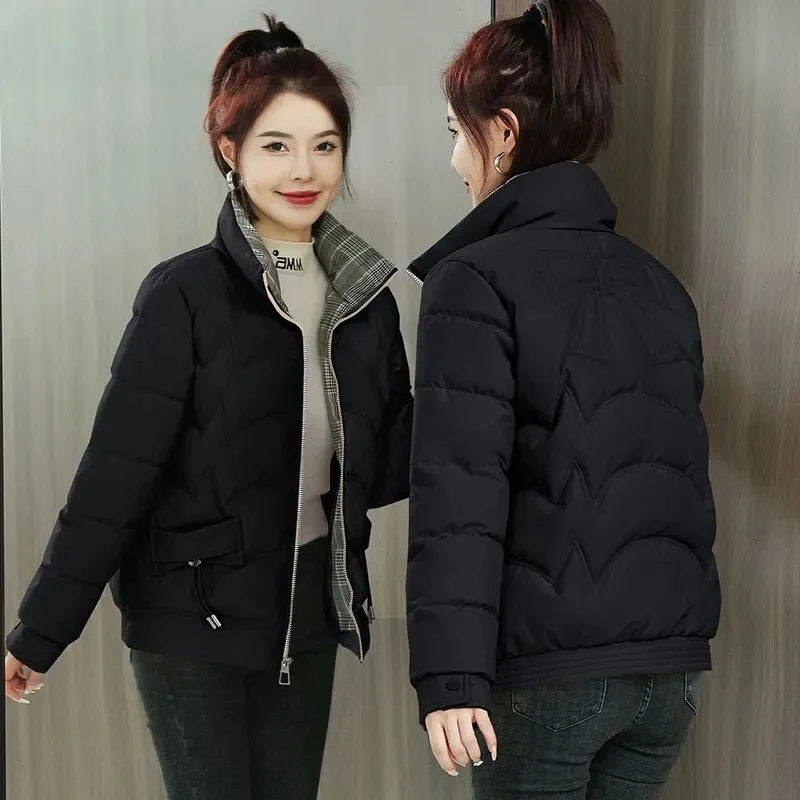 

Пуховик женский утепленный с хлопковой подкладкой и воротником-стойкой